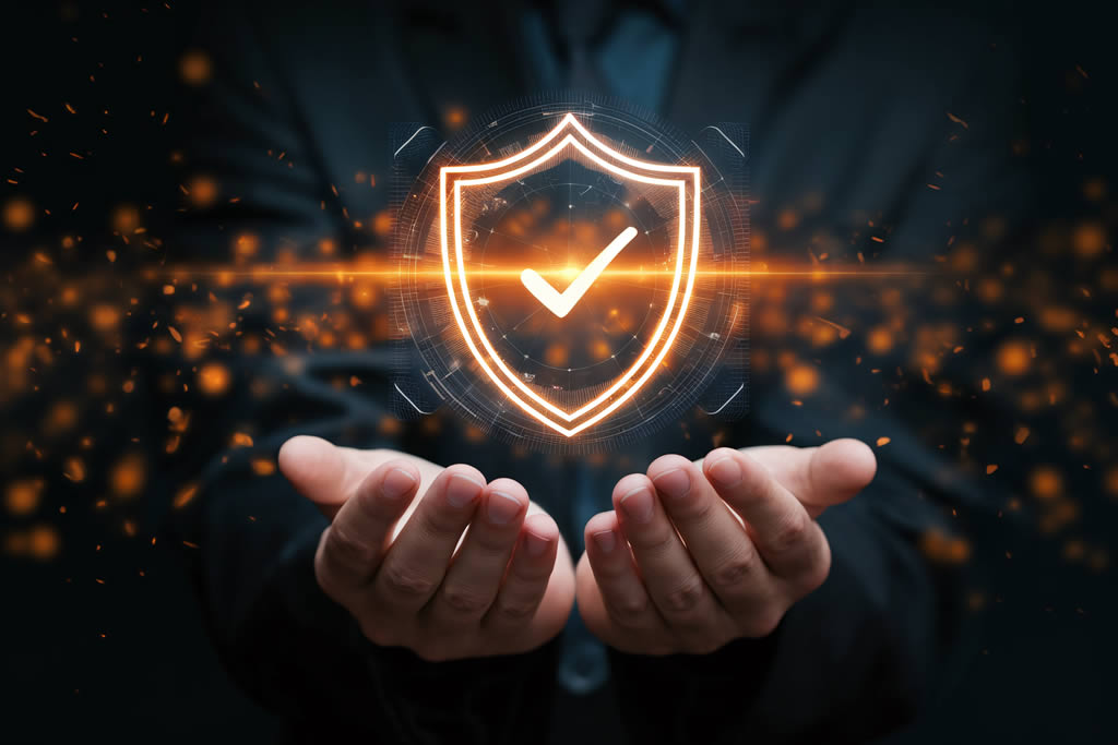 Digital shield with checkmark over hands